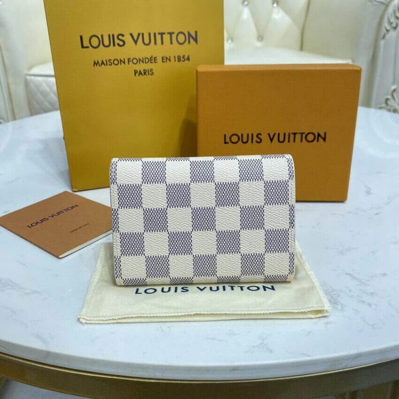 This compa Louis Vuitton Damier Azur Victorine Wallet - Image 3